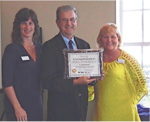 Tracy Levy, SafeSpace director of Development; Dr. Jack Mitchell, St. Lucie Volunteer of the Year; Janet Farnan-Dyer, SafeSpace Resource & Volunteer Coordinator